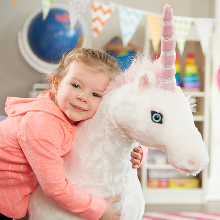 Melissa & Doug Toys to Celebrate National Unicorn Day child playing