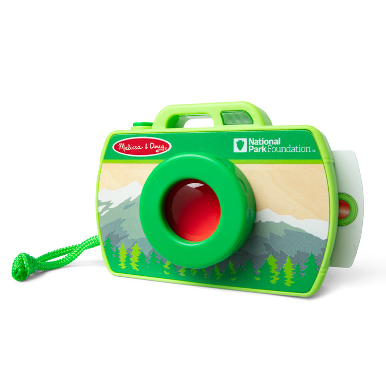 The loose pieces of The Melissa & Doug Rocky Mountain National Park Sights and Sounds Wooden Toy Camera Play Set