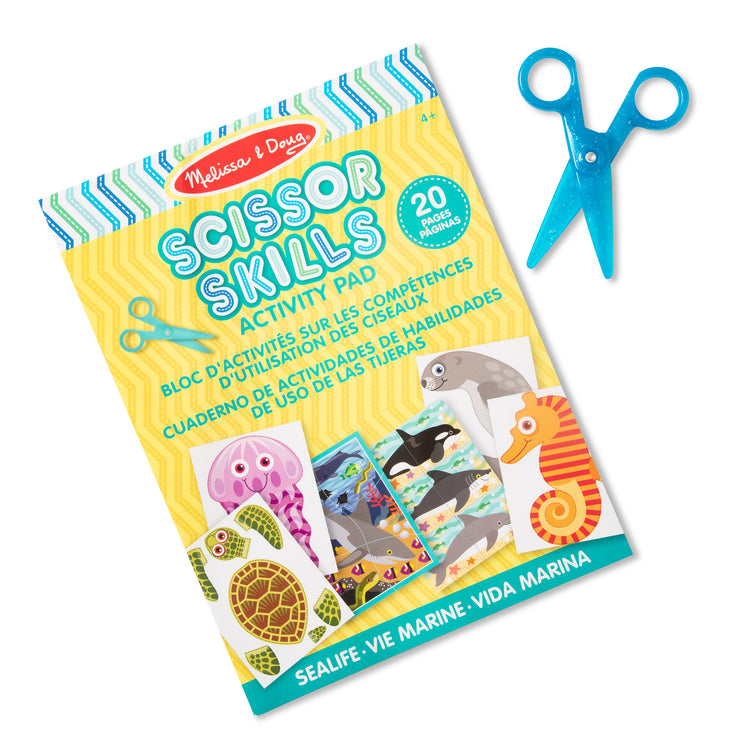 The loose pieces of The Melissa & Doug Sea Life Scissor Skills Activity Pad with Child-Safe Scissors – 20 Pages