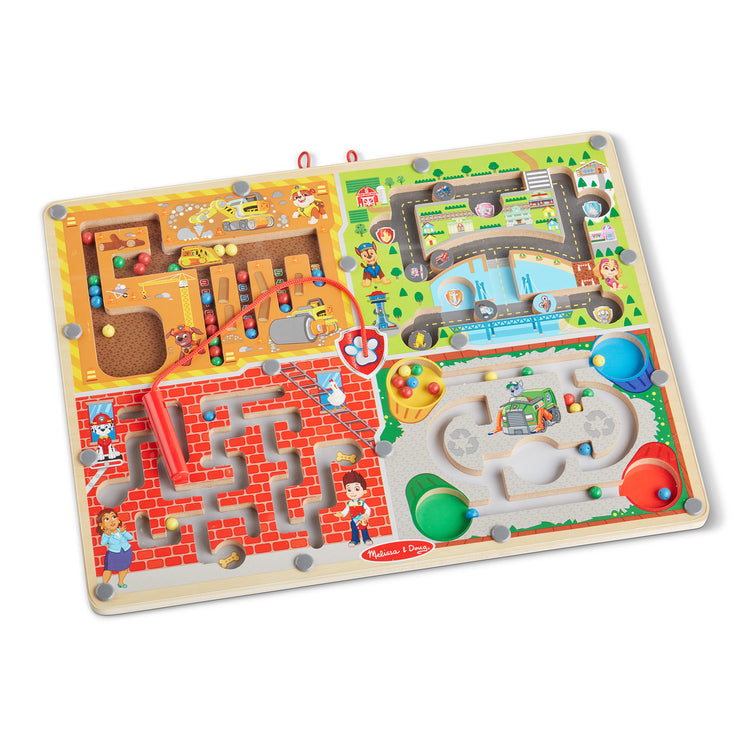 The loose pieces of The Melissa & Doug PAW Patrol Wooden 4-in-1 Magnetic Wand Maze Board