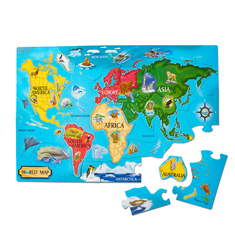 The loose pieces of The Melissa & Doug World Map Jumbo Jigsaw Floor Puzzle (33 pcs, 2 x 3 feet)