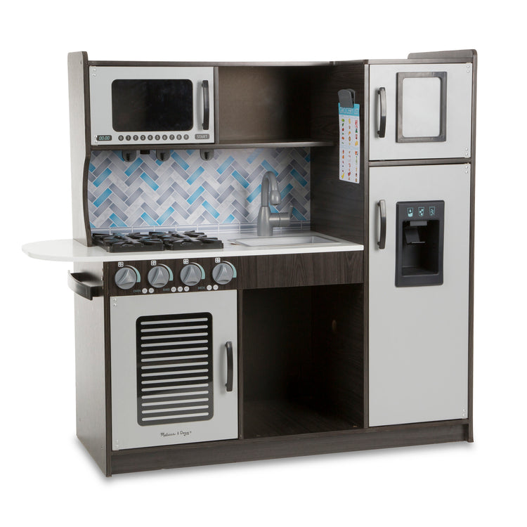 An assembled or decorated image of The Melissa & Doug Chef's Wooden Pretend Play Kitchen for Kids With “Ice” Cube Dispenser – Charcoal Gray
