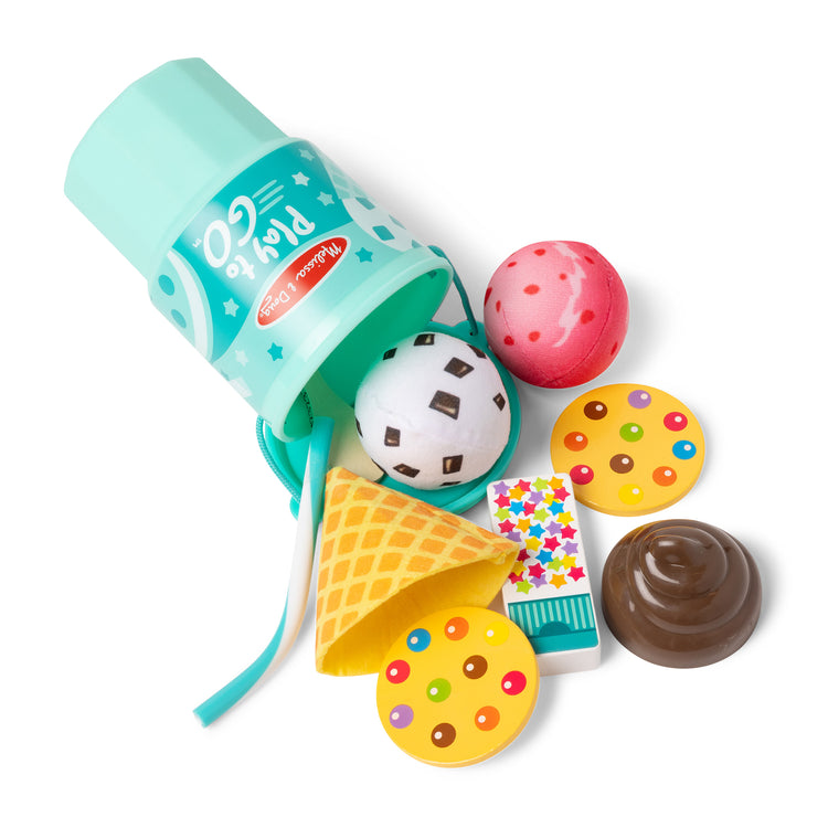 The loose pieces of The Melissa & Doug Play to Go Ice Cream Play Food Travel Toy Set in Cup with Fidget Toy Lid – 11 Pieces for Cones, Sandwiches, Shakes for Boys and Girls Ages 3+