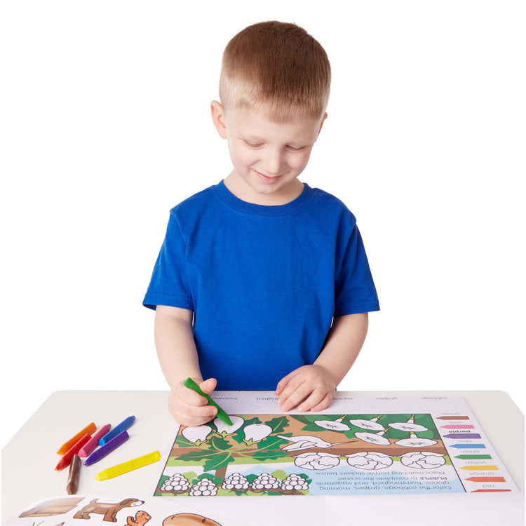 A child on white background with The Melissa & Doug Colors and Shapes Coloring and Sticker Activity Pad