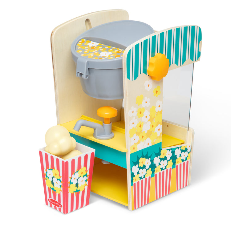 The loose pieces of The Melissa & Doug Fun at the Fair! Wooden Popcorn Popping Play Food Set