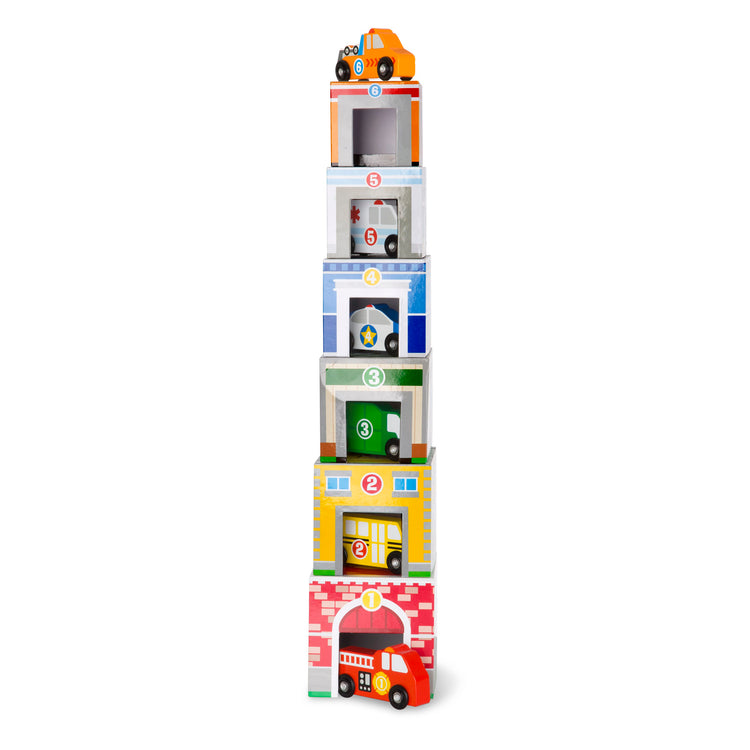 The loose pieces of The Melissa & Doug Nesting and Sorting Blocks - 6 Buildings, 6 Wooden Vehicles