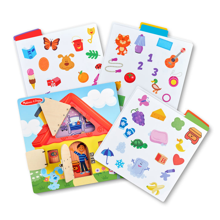 The loose pieces of The Melissa & Doug Blue’s Clues & You! Wooden Activity Board with Clue Cards