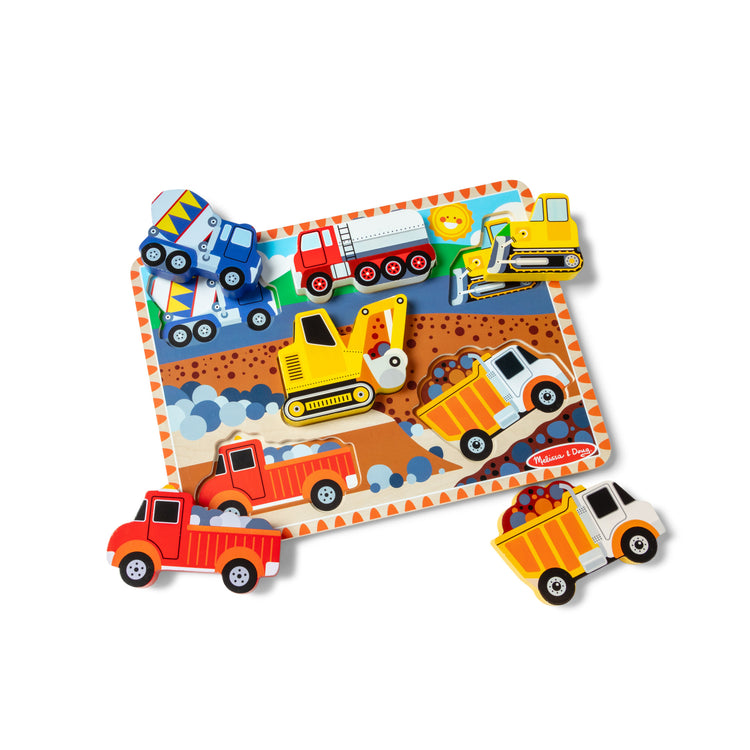 The loose pieces of The Melissa & Doug Construction Vehicles Wooden Chunky Puzzle (6 pcs)