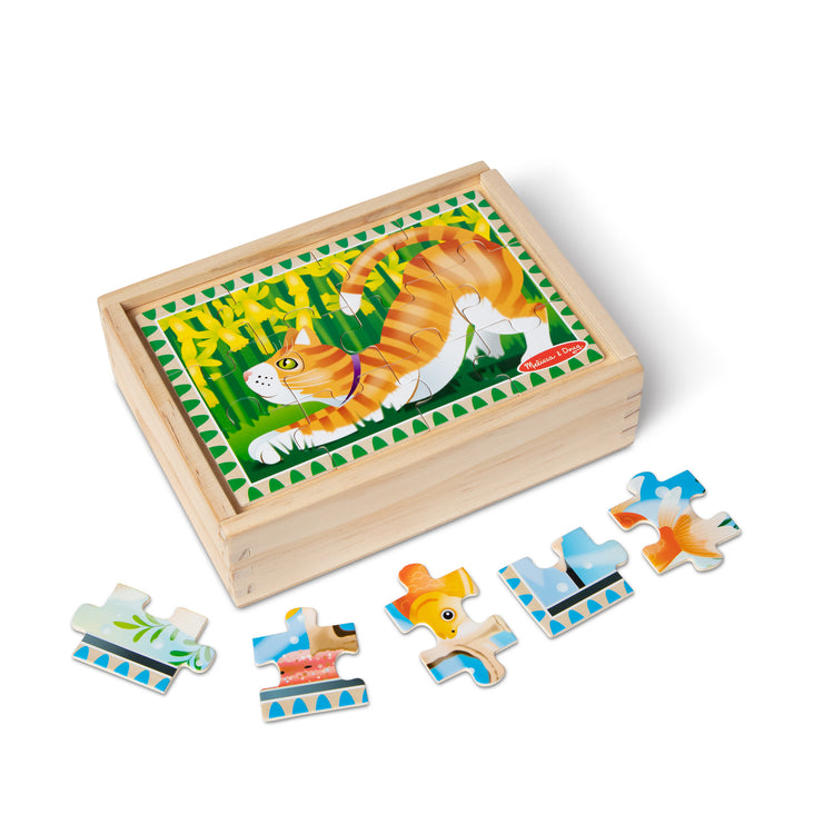 The loose pieces of The Melissa & Doug Wooden Jigsaw Puzzles in a Box 2-Pack for Preschool Boys and Girls – Pets, Vehicles