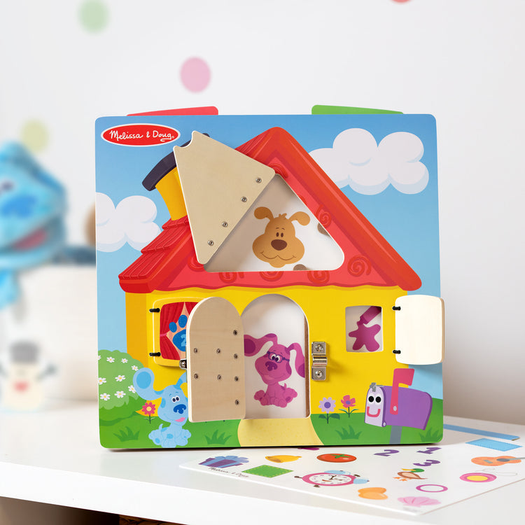 A playroom scene with The Melissa & Doug Blue’s Clues & You! Wooden Activity Board with Clue Cards