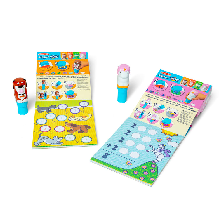 The loose pieces of The Melissa & Doug Sticker WOW!™ Dog and Unicorn Bundle: 2 24-Page Activity Pads, 2 Sticker Stampers, 600 Stickers, Arts and Crafts Fidget Toy Collectible Characters