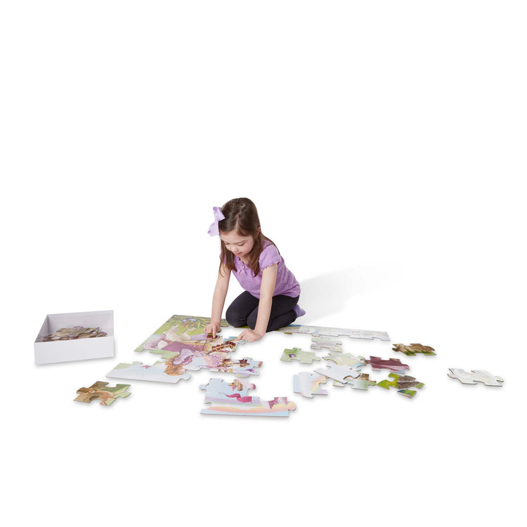 A child on white background with The Melissa & Doug Fairy Tale Castle Jumbo Jigsaw Floor Puzzle (48 pcs, 2 x 3 feet)
