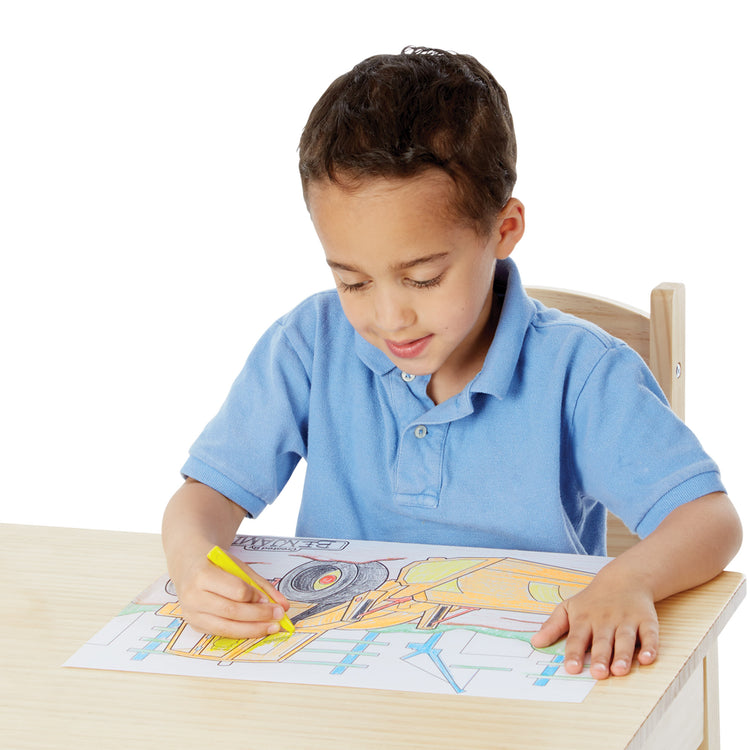 A child on white background with The Melissa & Doug Jumbo 50-Page Kids' Coloring Pad - Space, Sharks, Sports, and More