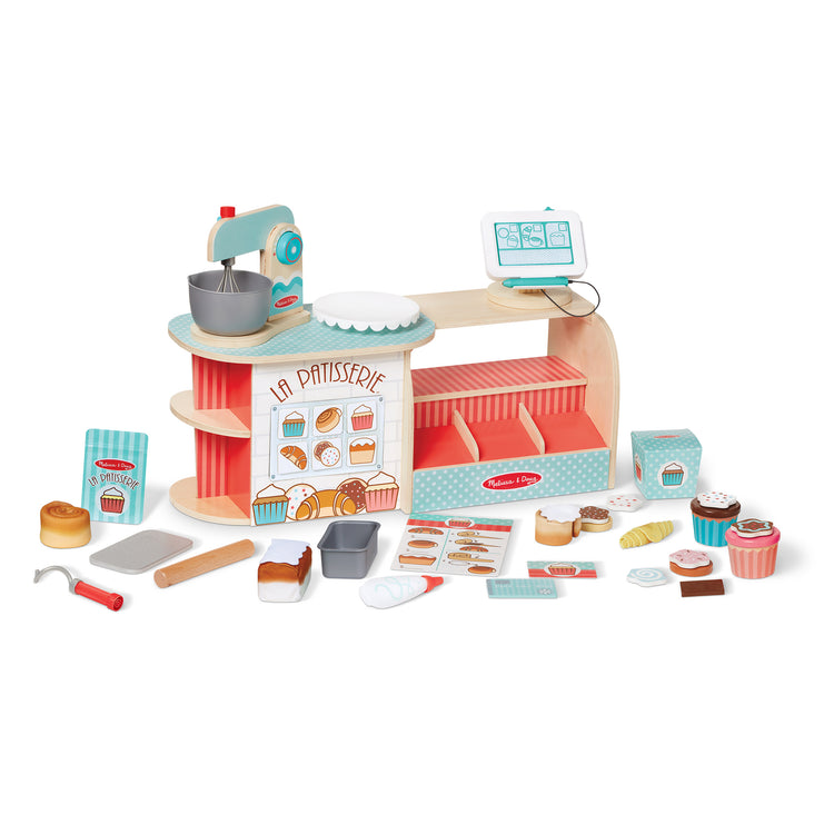 The loose pieces of The Melissa & Doug Wooden La Patisserie Bakery (39 Pieces)