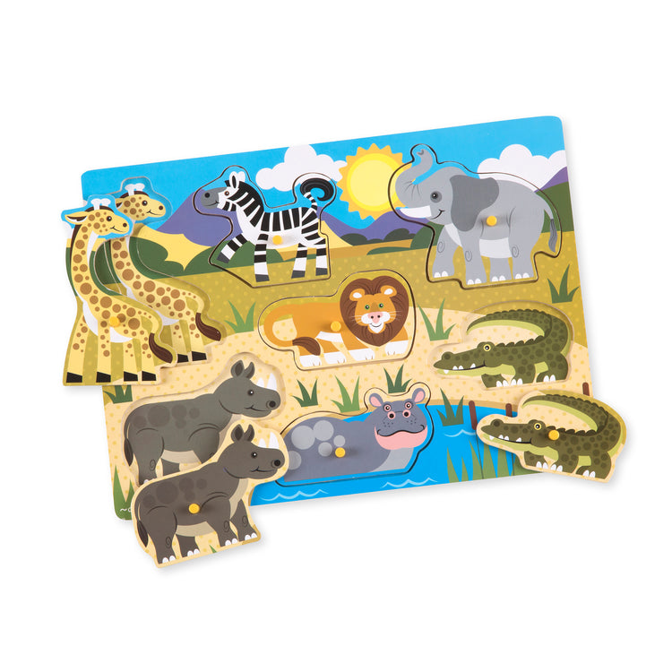 The loose pieces of The Melissa & Doug Wooden Peg Puzzle 4-Pack for Toddler and Preschool Boys and Girls – Vehicles, Farm, Safari, Pets