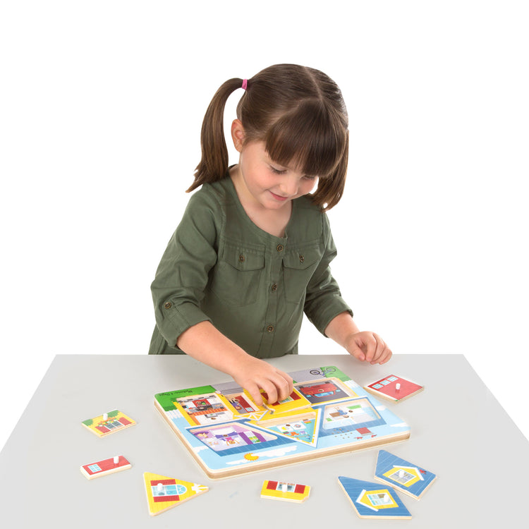A child on white background with The Melissa & Doug Around the House Sound Puzzle - Wooden Peg Puzzle (8 pcs)