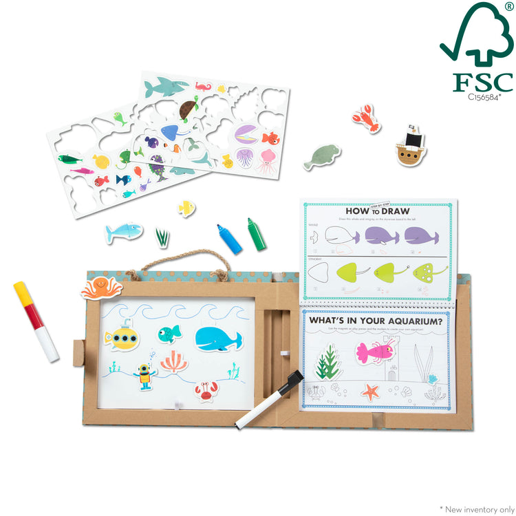 The loose pieces of The Melissa & Doug Natural Play: Play, Draw, Create Reusable Drawing & Magnet Kit – Ocean (42 Magnets, 5 Dry-Erase Markers)