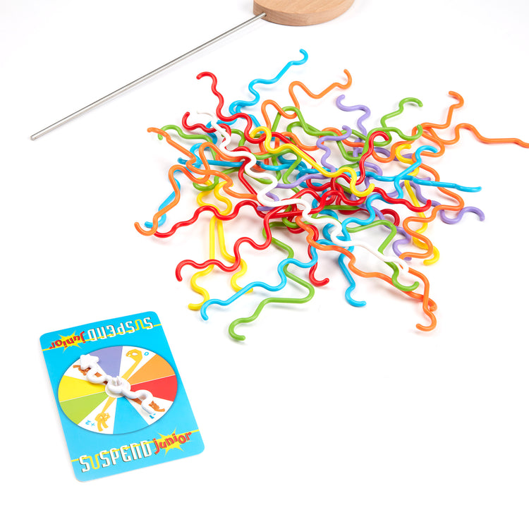 The loose pieces of The Melissa & Doug Suspend Junior Family Game (31 pcs)