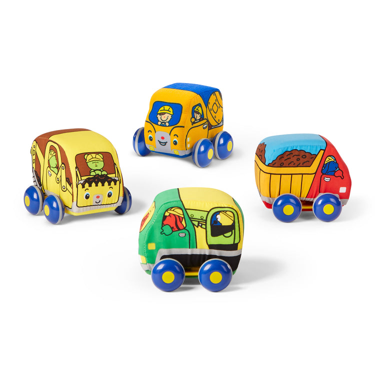 The loose pieces of The Melissa & Doug Pull-Back Construction Vehicles - Soft Baby Toy Play Set of 4 Vehicles