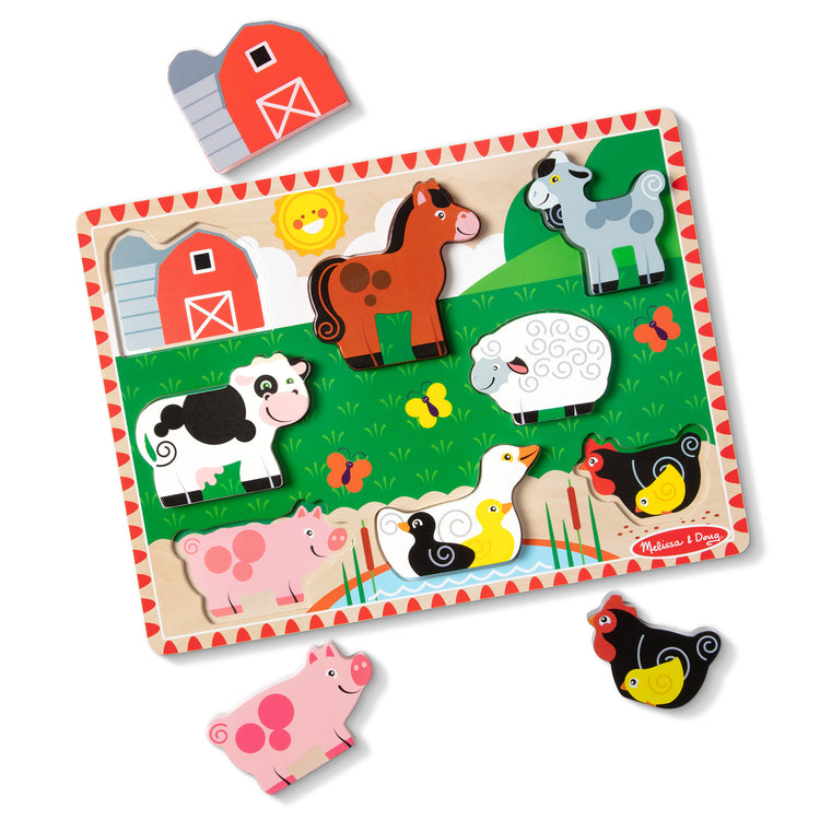 The loose pieces of The Melissa & Doug Farm Wooden Chunky Puzzle (8 pcs)