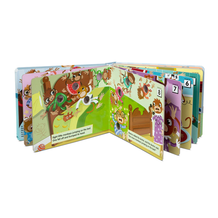 The loose pieces of The Melissa & Doug Children's Book - Poke-a-Dot: 10 Little Monkeys (Board Book with Buttons to Pop)