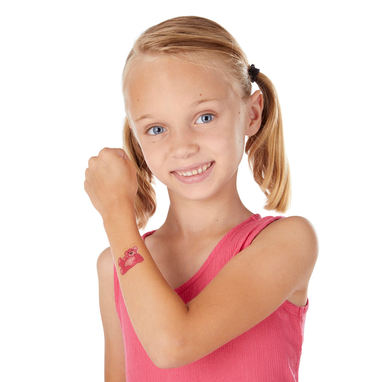 A child on white background with The My First Temporary Tattoos - Pink