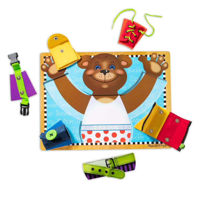 The loose pieces of the Melissa & Doug Basic Skills Puzzle Board - Wooden Educational Toy