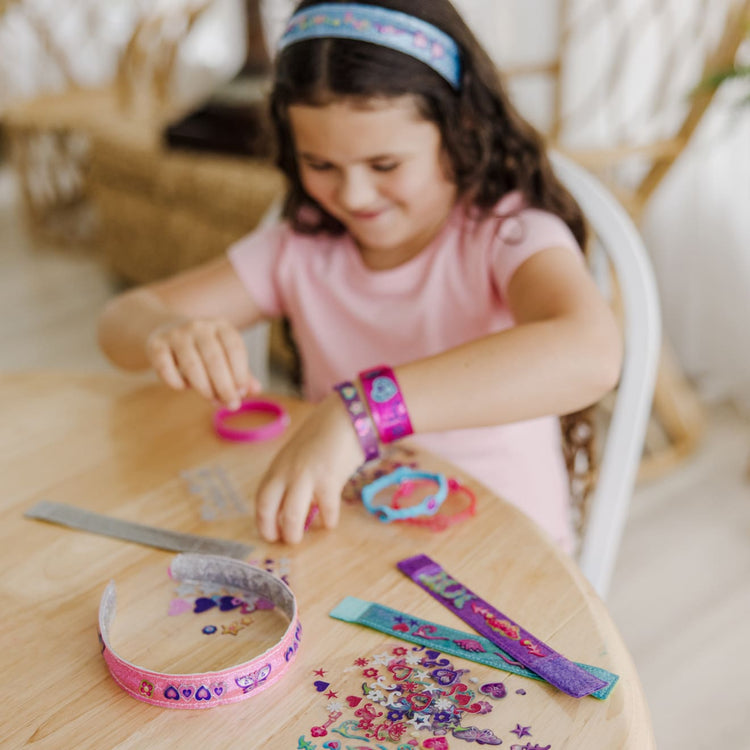 The front of the box for the Melissa & Doug Design-Your-Own Bracelets With 100+ Sparkle Gem and Glitter Stickers