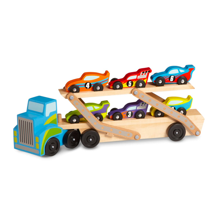 An assembled or decorated the Melissa & Doug Mega Race-Car Carrier - Wooden Tractor and Trailer With 6 Unique Race Cars