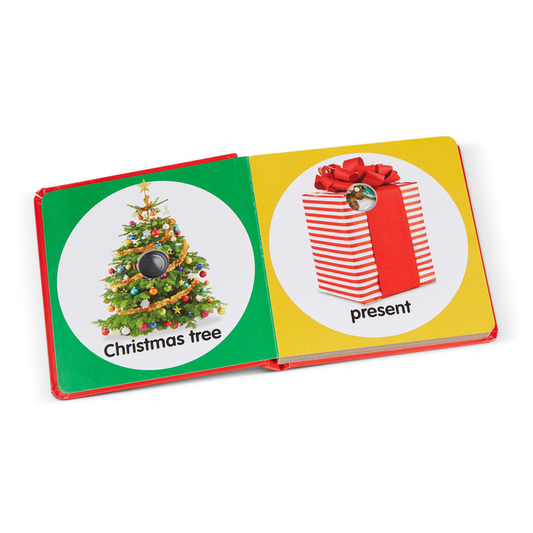 The loose pieces of the Melissa & Doug Children’s Book – Poke-a-Dot: Christmas (Board Book with Buttons to Pop)