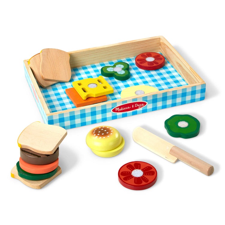 The loose pieces of the Melissa & Doug Wooden Sandwich-Making Pretend Play Food Set