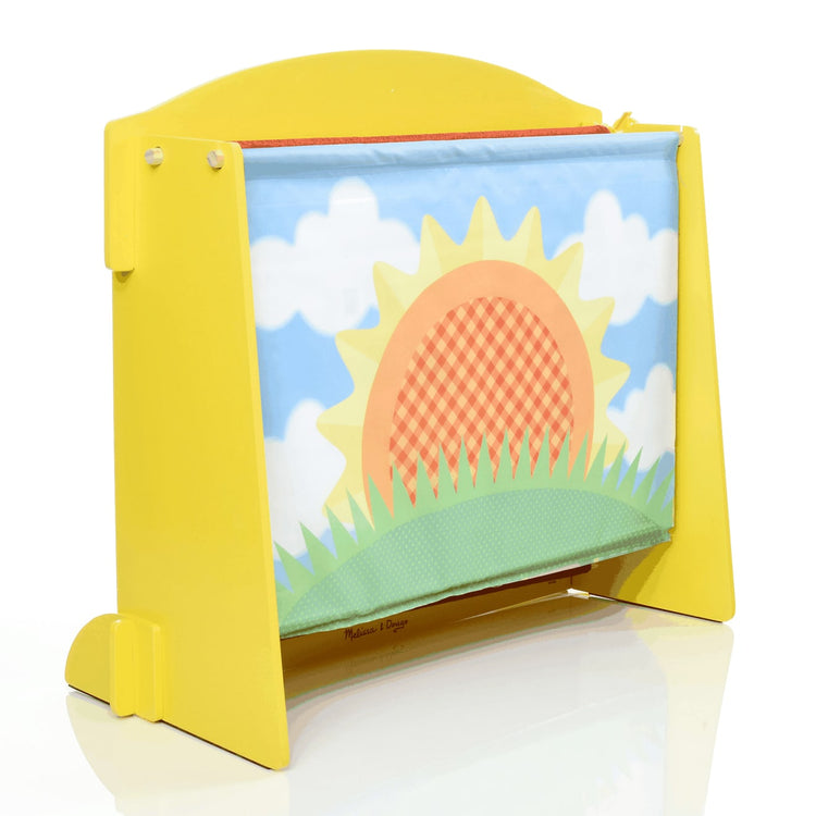 The loose pieces of the Melissa & Doug Tabletop Puppet Theater - Sturdy Wooden Construction
