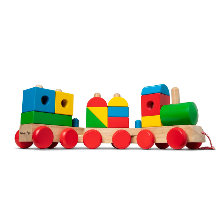 The loose pieces of the Melissa & Doug Wooden Jumbo Stacking Train – 4-Color Classic Wooden Toddler Toy (17 pcs)