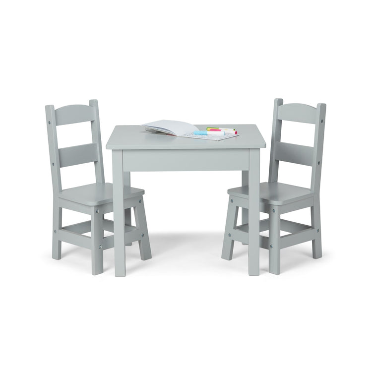 The loose pieces of the Melissa & Doug Kids Furniture Wooden Table and 2 Chairs - Gray