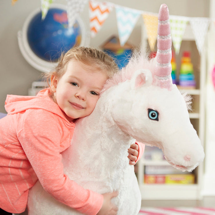 Melissa & Doug Toys to Celebrate National Unicorn Day child playing