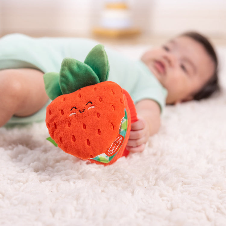 Melissa & Doug Toys to Celebrate National Strawberry Day baby playing