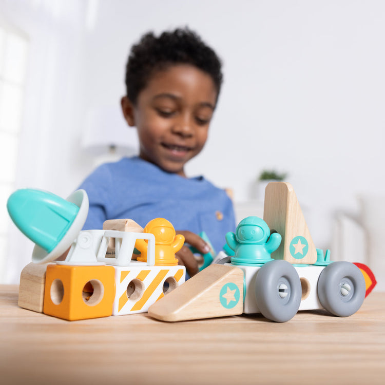 Melissa & Doug Toy Spotlight Blockables Space Play Set blog post child playing