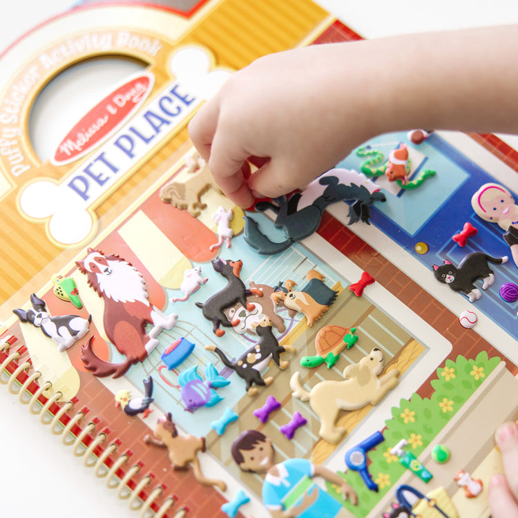 child playing with melissa & doug puzzle