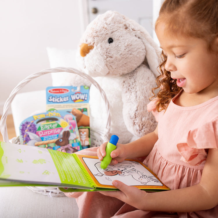 Melissa & Doug Best Easter Baskets for Kids by Age & Theme blog post child playing