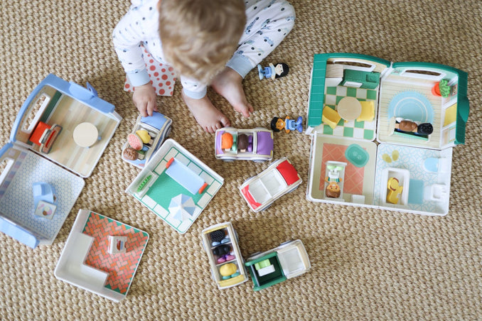 Melissa & Doug Danielle Moss Why Melissa & Doug is My Favorite Toy Brand as a Parent blog post child playing