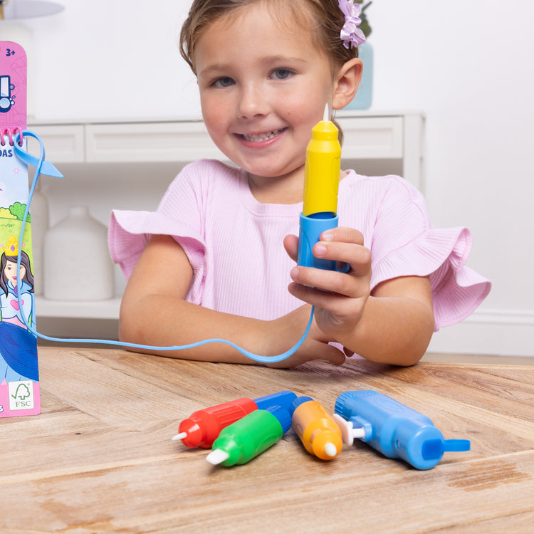 The front of the box for The Melissa & Doug Water WOW! Pen Pack - 4 Color-with-Water Pens, Sprayer, Tether Cap