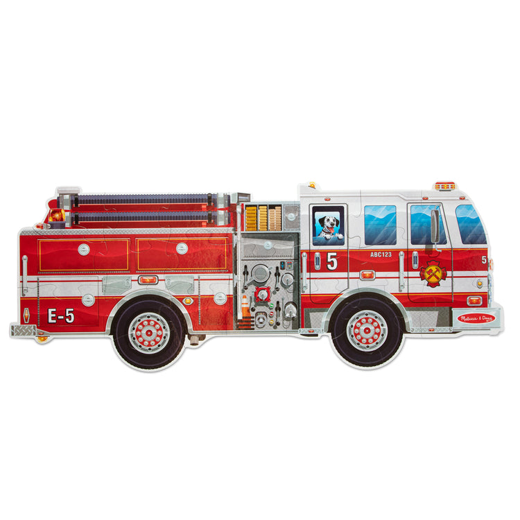 The loose pieces of The Melissa & Doug Giant Fire Truck Shaped Jumbo Floor Puzzle, 24-Piece Fire Engine Jigsaw Puzzle, Over 4 Ft Long Kids Puzzles for Toddlers Ages 3+