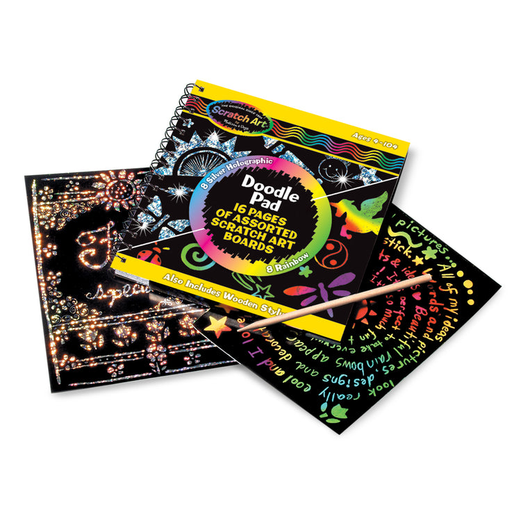 The loose pieces of The Melissa & Doug Scratch Art Doodle Pad With 16 Scratch-Art Boards and Wooden Stylus