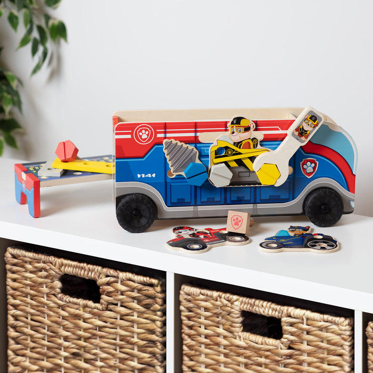 A playroom scene with The Melissa & Doug PAW Patrol Match & Build Mission Cruiser