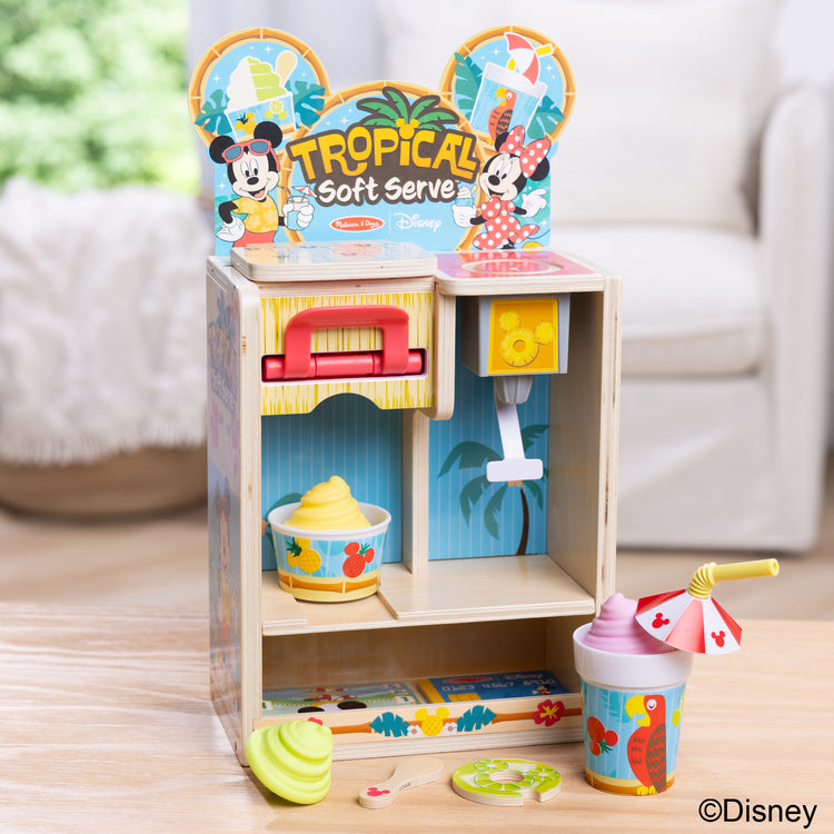 A playroom scene with The Disney Tropical Soft Serve Ice Cream Wooden Play Food Set – 23 Pieces | Mickey Mouse, Minnie, Wooden Toy for Boys and for Girls 3+