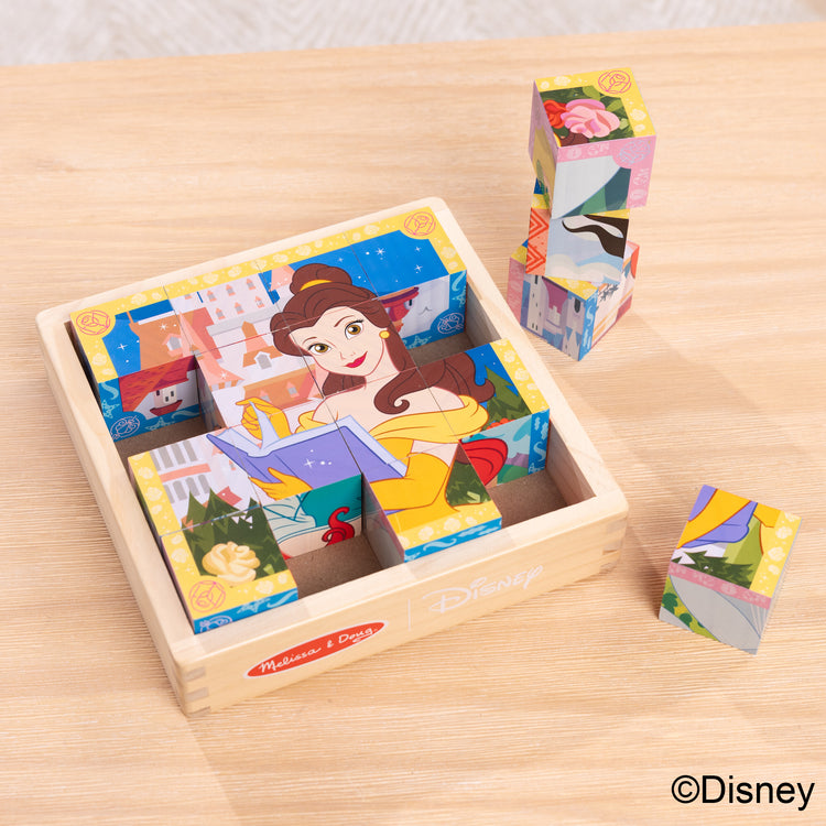 A playroom scene with The Melissa & Doug Disney Princess Wooden Toy Cube Puzzle Blocks for Boys and for Girls 3+
