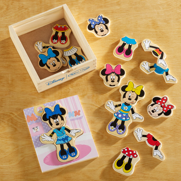A playroom scene with The Melissa & Doug Disney Minnie Mouse Mix and Match Dress-Up Wooden Play Set Puzzle (18 pcs)