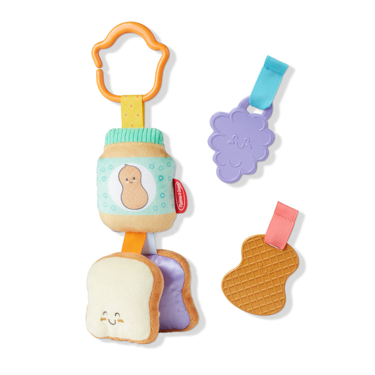 The loose pieces of The Melissa & Doug Multi-Sensory PB&J Take-Along Clip-On Infant Toy