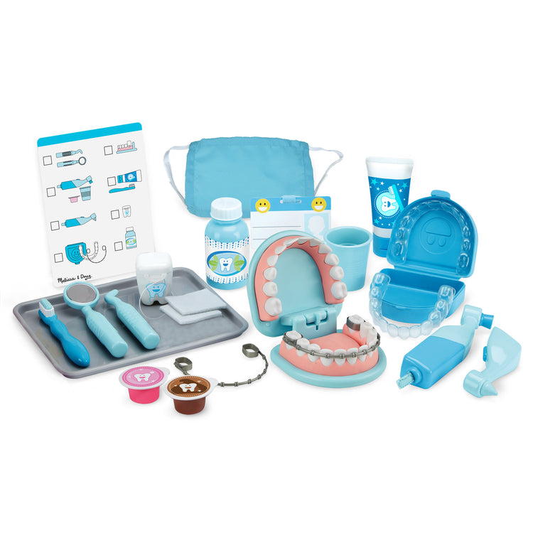 The loose pieces of The Melissa & Doug Super Smile Dentist Kit With Pretend Play Set of Teeth And Dental Accessories (25 Toy Pieces)