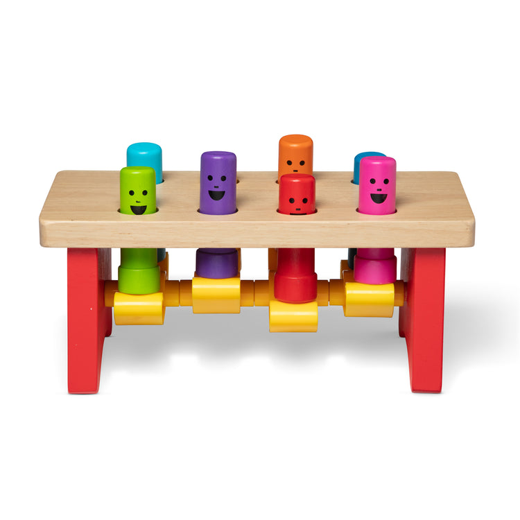 The loose pieces of The Melissa & Doug Deluxe Pounding Bench Wooden Toy With Mallet